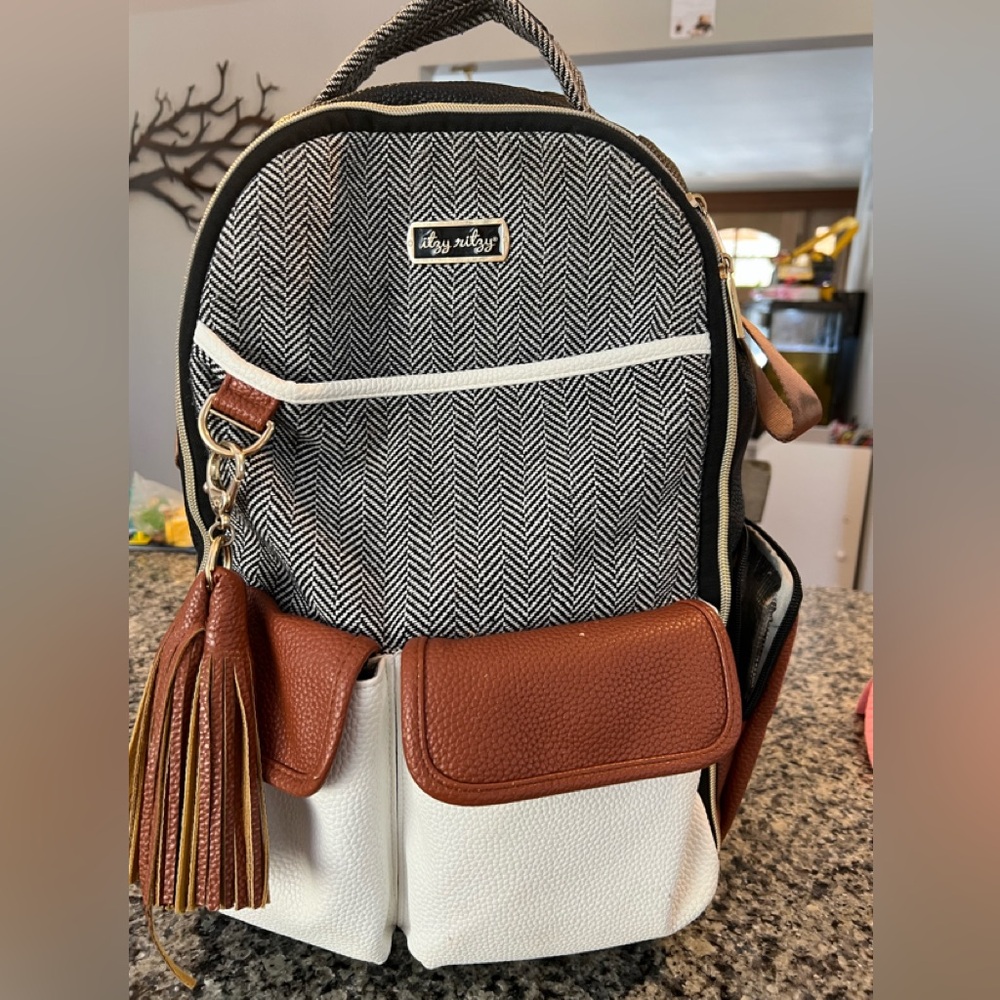Itzy Ritzy Black and Brown Backpack with Leather Accents